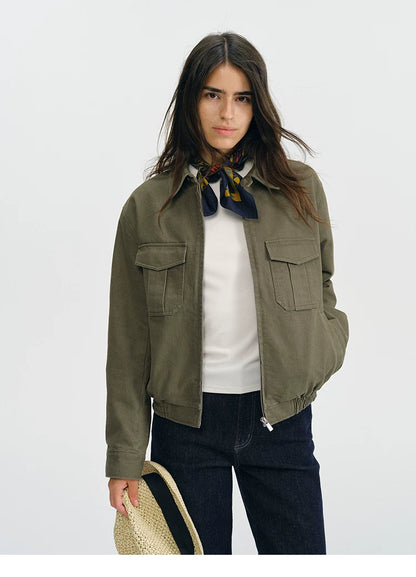 Olive cropped utility jacket worn open with the collar turned down, front view