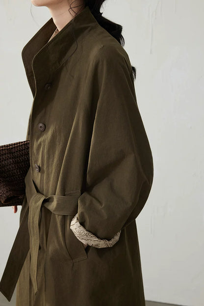 Close-up of an Olive trench coat&
