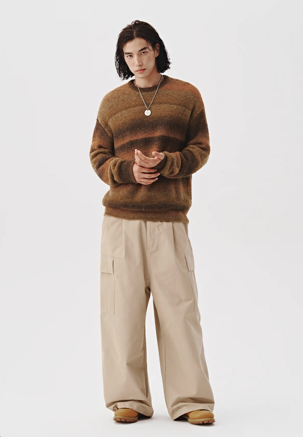 Men’s ombre knit sweater in warm sienna, front view with relaxed fit.