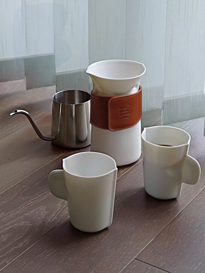 Milk White pour over coffee set placed on wooden table with cups and filter cup ready for brewing