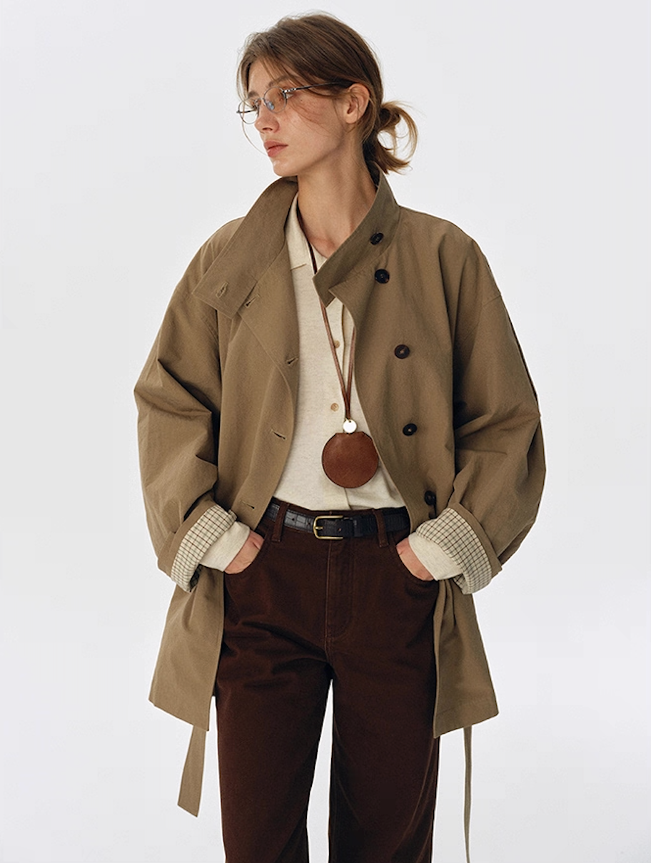 Model wearing palm khaki salt-shrunk trench jacket, relaxed front view