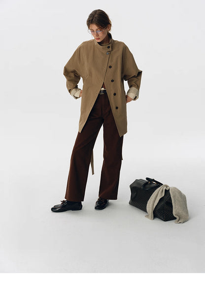 Palm khaki trench jacket buttoned up with relaxed silhouette