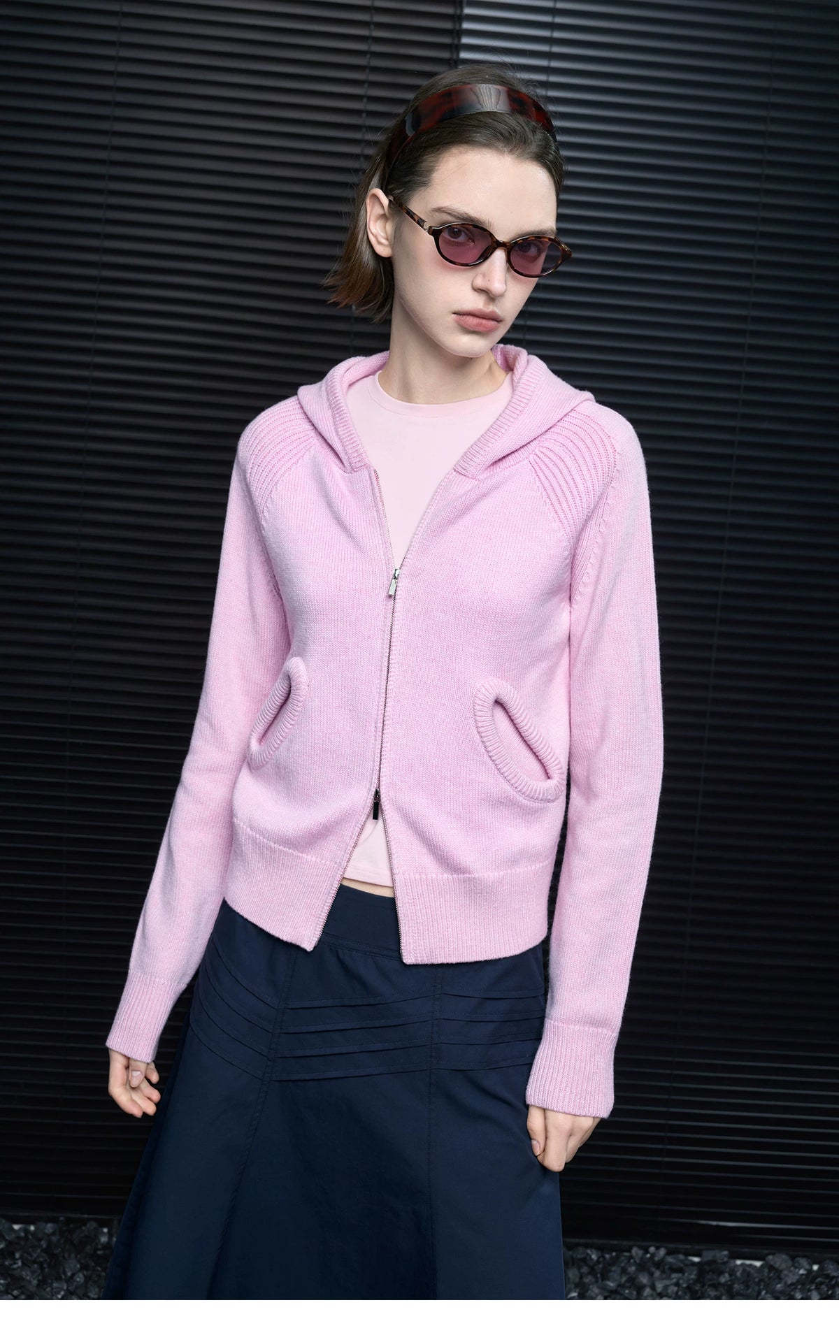 Front view of Pastel Pink hooded zip cardigan showing sculpted ribbed pockets and ribbed raglan shoulders