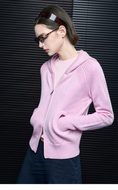 Side close-up of Pastel Pink zip cardigan showing ribbed raglan shoulder texture and two-way zipper