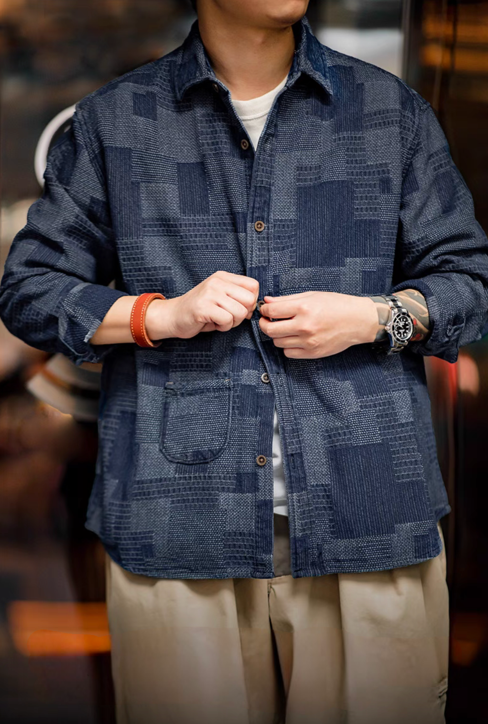 Denim Blue patchwork indigo shirt worn front view showing button closure, textured fabric, and relaxed casual fit