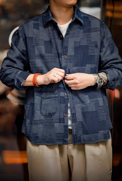 Denim Blue patchwork indigo shirt worn front view showing button closure, textured fabric, and relaxed casual fit