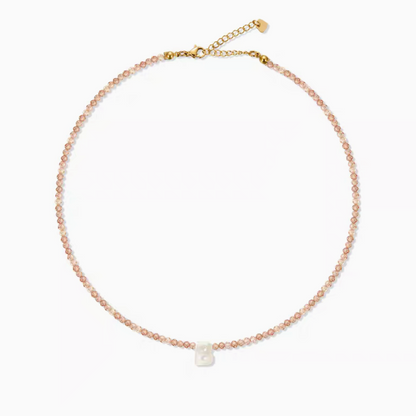 Natural color personalized shell initial necklace with letter B charm on beaded chain product view
