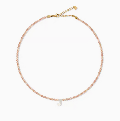 Personalized shell initial necklace with letter J charm on natural stone beaded chain simple product view