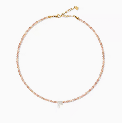 Personalized shell initial necklace with letter P charm on natural stone beaded chain clean product view