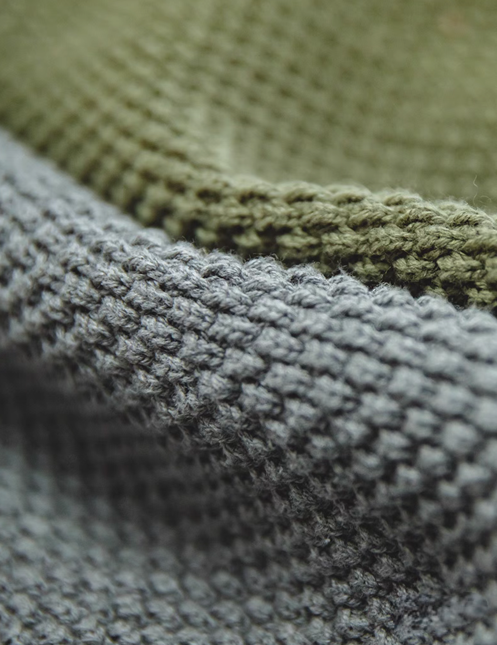 Close-up of Pineapple Textured Crewneck Sweater showing detailed chunky knit texture in polar gray and warsaw green