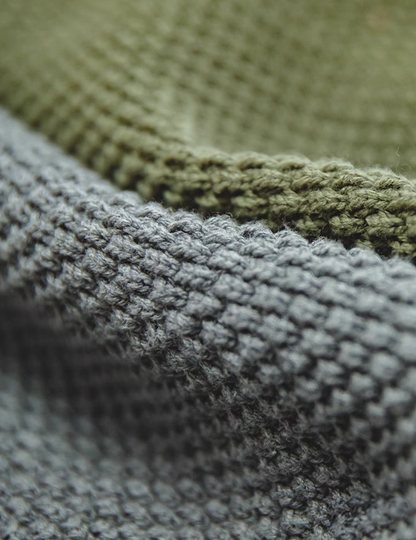 Close-up of Pineapple Textured Crewneck Sweater showing detailed chunky knit texture in polar gray and warsaw green