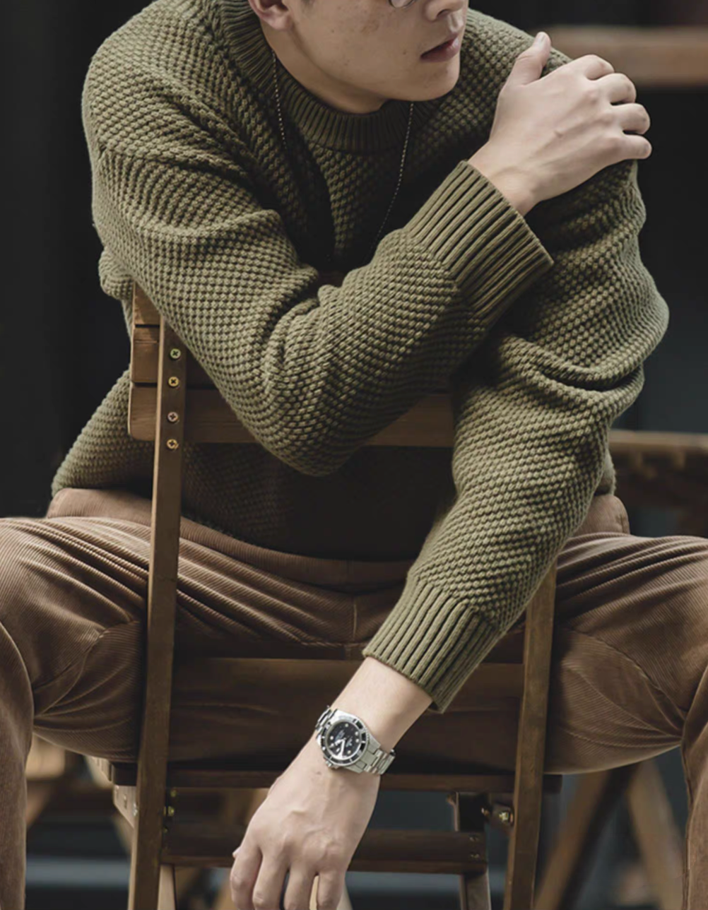 Pineapple Textured Crewneck Sweater warsaw green styled in seated pose highlighting chunky knit and vintage appeal