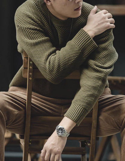 Pineapple Textured Crewneck Sweater warsaw green styled in seated pose highlighting chunky knit and vintage appeal