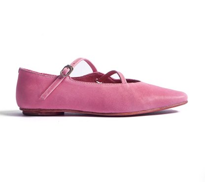 Side profile of a Pink washed leather ballet flat with softly squared toe and buckle strap