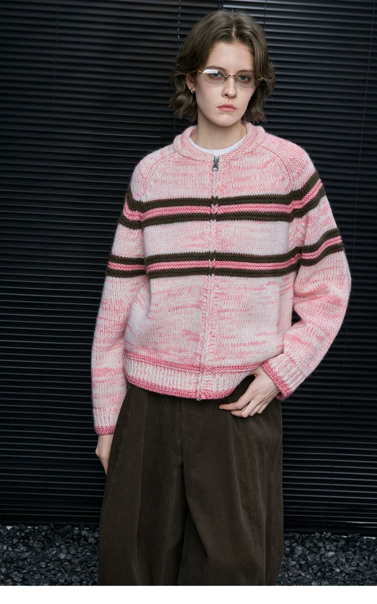 Front view of Pink Stripe knit cardigan zipped up, showing rolled round neckline and brown stripes