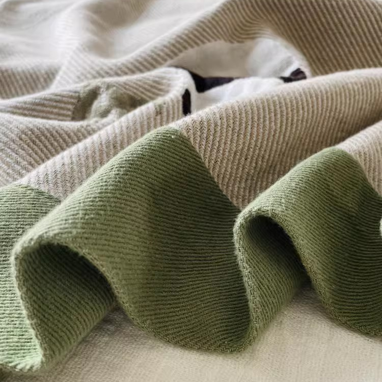 Close-up of Playful Pals Cotton Gauze Quilted Blanket Panda showing breathable cotton gauze texture