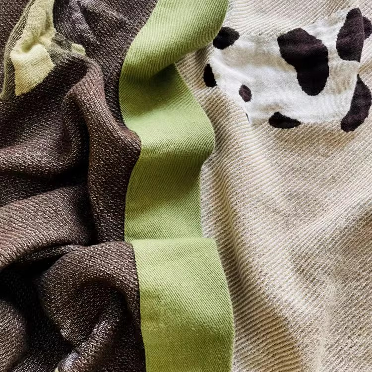 Playful Pals Cotton Gauze Quilted Blanket Panda reverse side showing textured cotton fabric with green border