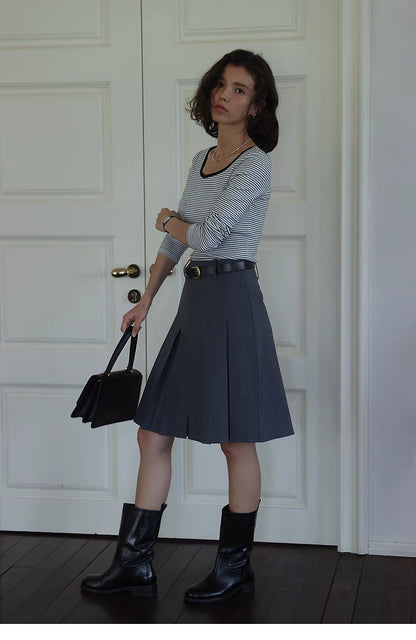 Pleated Chic Skirt gray full body outfit styled with boots and belt, showcasing versatile casual to dressy styling