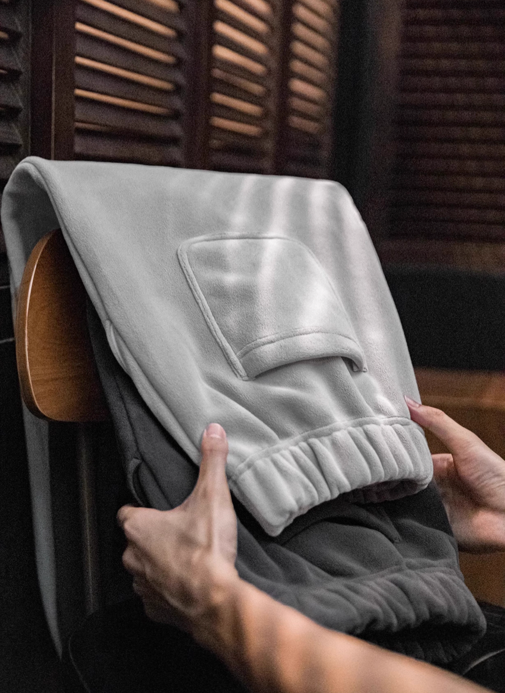 Ultra soft fleece Plush Relax Joggers folded showing back patch pocket and elastic cuff detail for maximum comfort