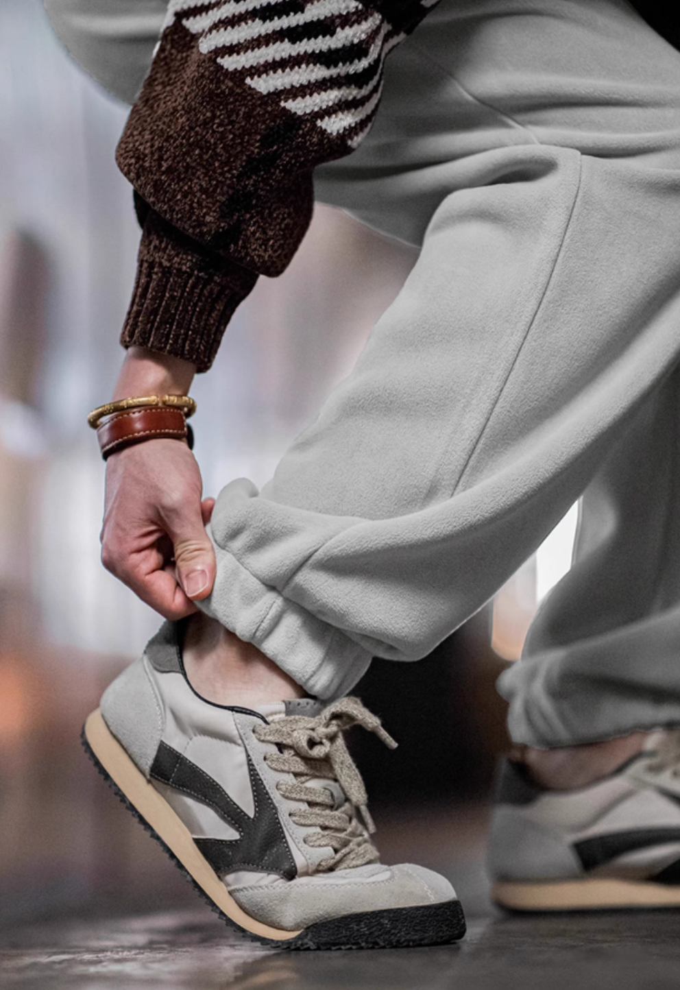 Detailed view of Plush Relax Joggers in Tin Gray highlighting premium fleece fabric and relaxed structure