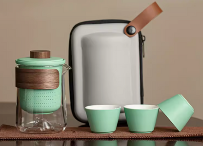 Light green portable outdoor travel tea set with glass teapot cups and carrying case