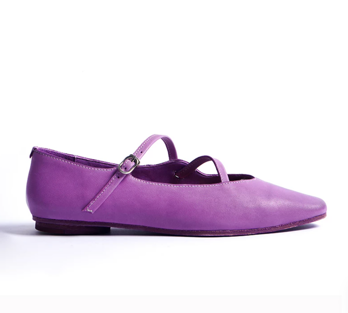 Side profile of a Purple washed leather ballet flat with buckle strap and low flat heel
