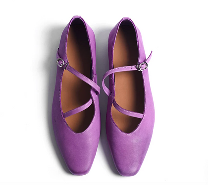Top-down view of Purple washed leather ballet flats with crisscross buckle straps
