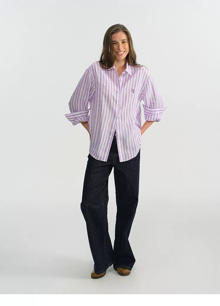 Front view of purple stripe linen shirt with embroidered logo detail