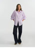 Front view of purple stripe linen shirt with embroidered logo detail