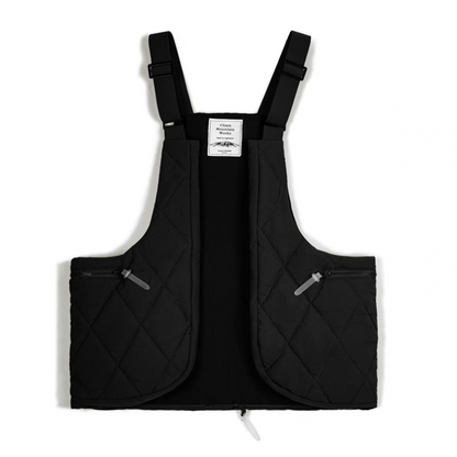 Black quilted convertible vest bag front view with padded diamond pattern.