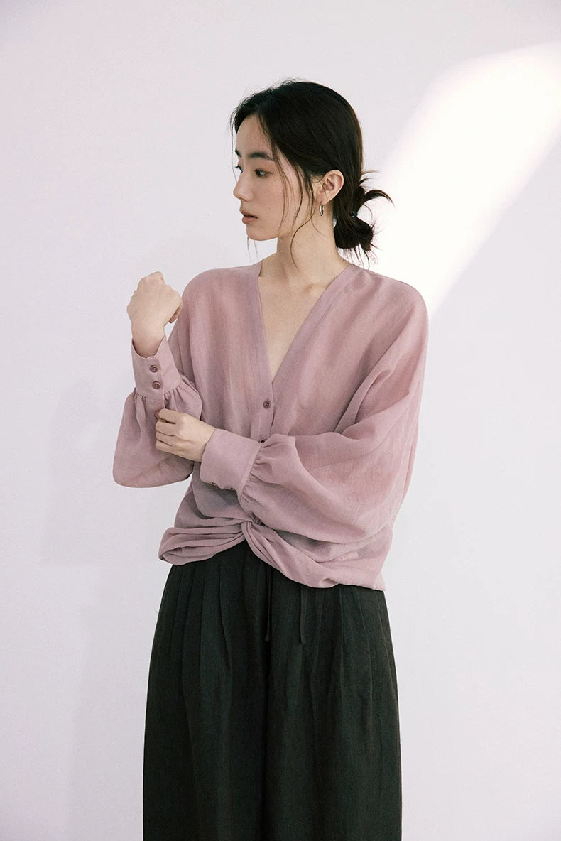 Close-up of dusty rose ramie-Tencel blouse gathered cuff and sleeve detail