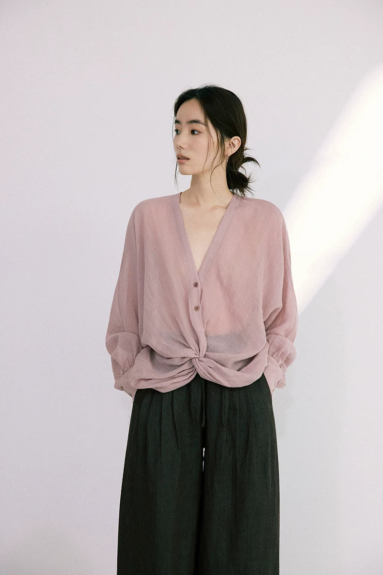 Front view of dusty rose ramie-Tencel blouse with balloon sleeves