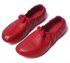 Pair of red sheepskin ballet flats with braided leather knots and gathered elastic topline, front angle view