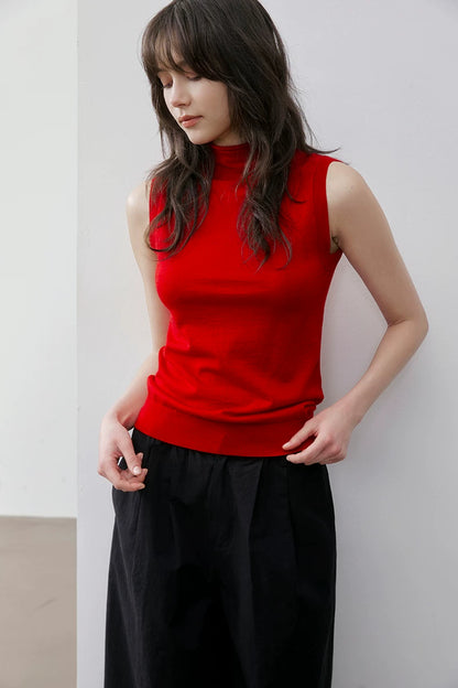 Three-quarter front view of Red slim-fit mock neck knit top