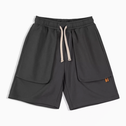 Relaxed Fit Utility Shorts with Deep Pocket Design dark gray front view featuring elastic waistband and large pockets