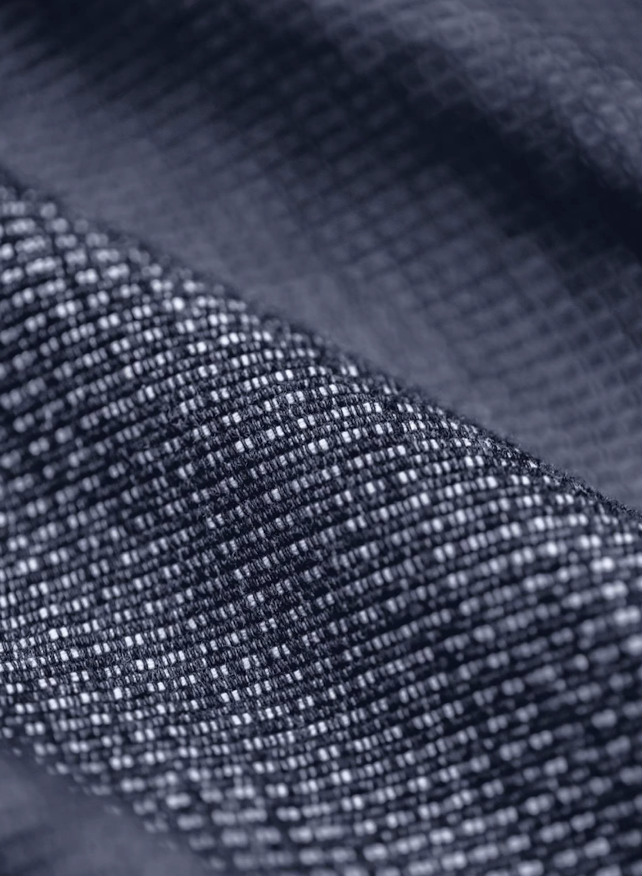 Detailed macro shot of waffle weave denim fabric texture