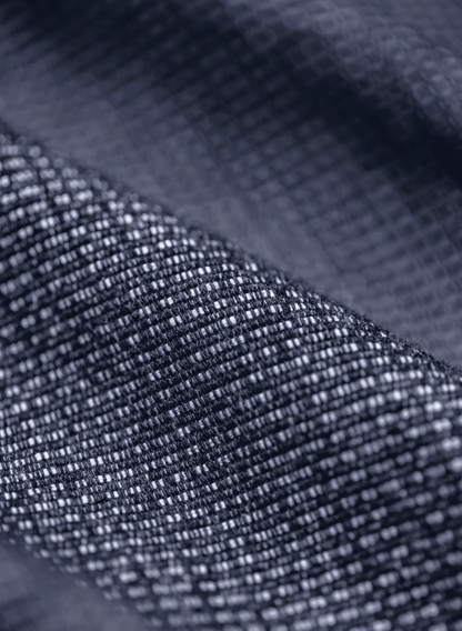 Detailed macro shot of waffle weave denim fabric texture