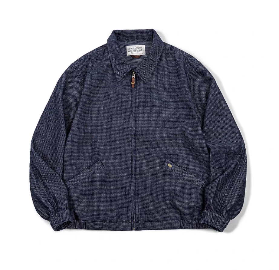 Flat lay view of retro denim waffle weave coach jacket with zipper front
