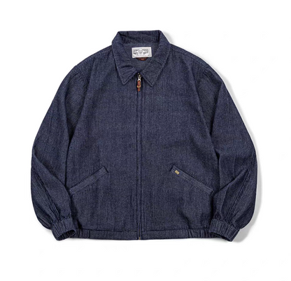 Flat lay view of retro denim waffle weave coach jacket with zipper front