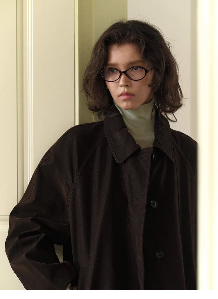 Close up of Chocolate Brown Retro Elegance Oversized Coat highlighting lapel collar and matte suede texture