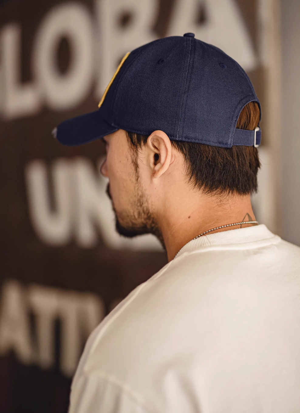 Back view of Retro Explorer Cap dark blue showing adjustable buckle strap cotton twill construction and comfortable fit design