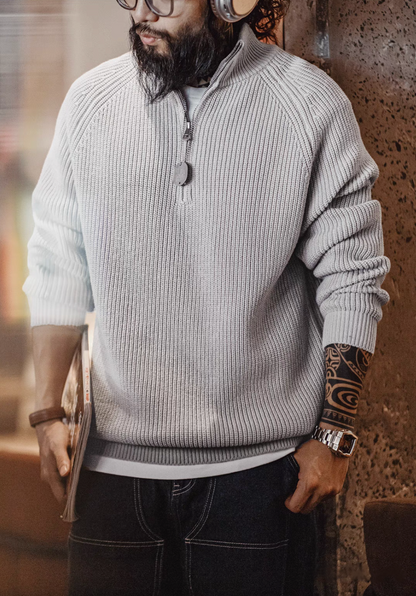 Man wearing Ridge Half-Zip Pullover Sweater in Smoky Gray featuring ribbed knit texture half-zip collar and straight relaxed fit styling
