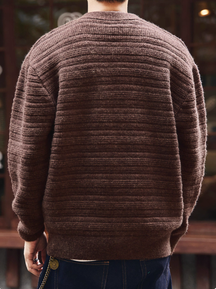 Back view of men’s brown ripple knit cardigan with ribbed hem and cuffs