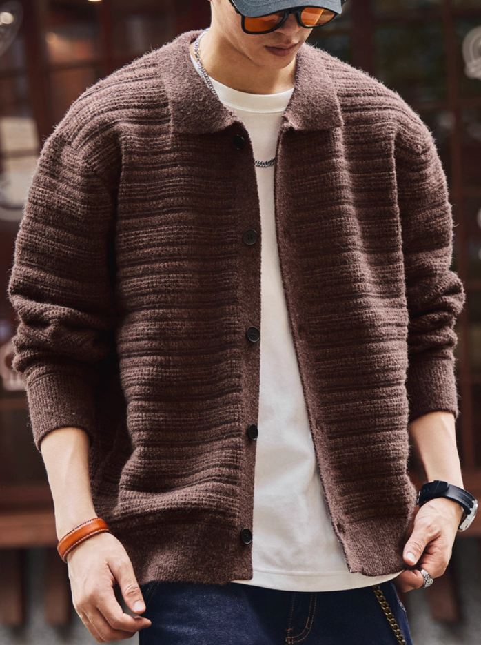 Model wearing brown ripple textured cardigan with button front and relaxed fit