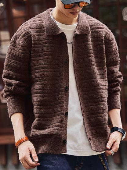 Model wearing brown ripple textured cardigan with button front and relaxed fit