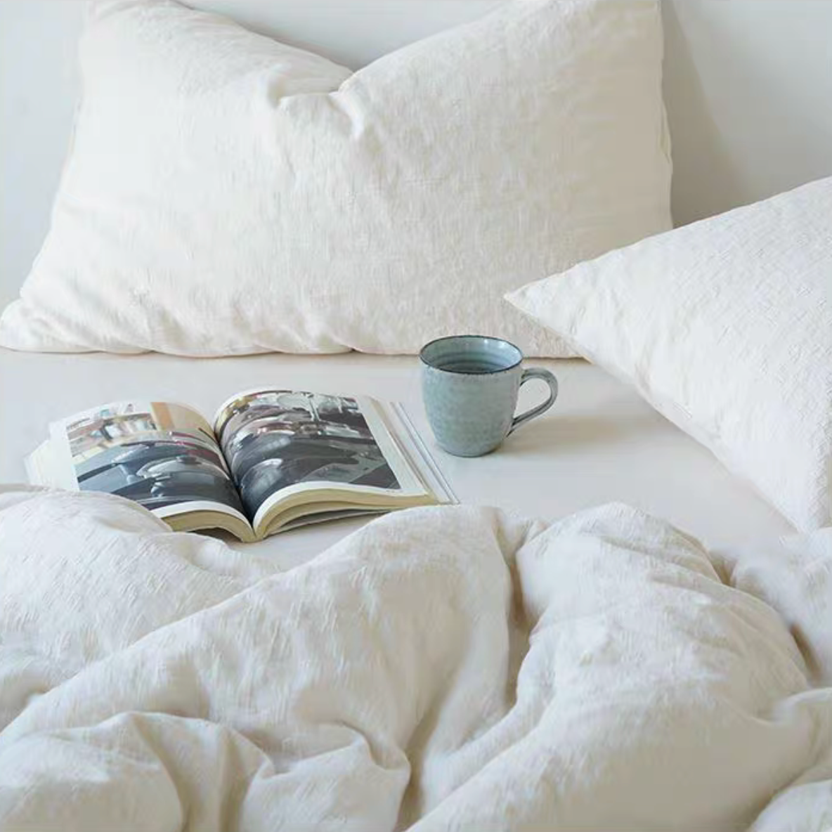 Rock Point cotton comforter, sheet and shams set in Leopard Print Cream styled on bright minimalist bedroom bed