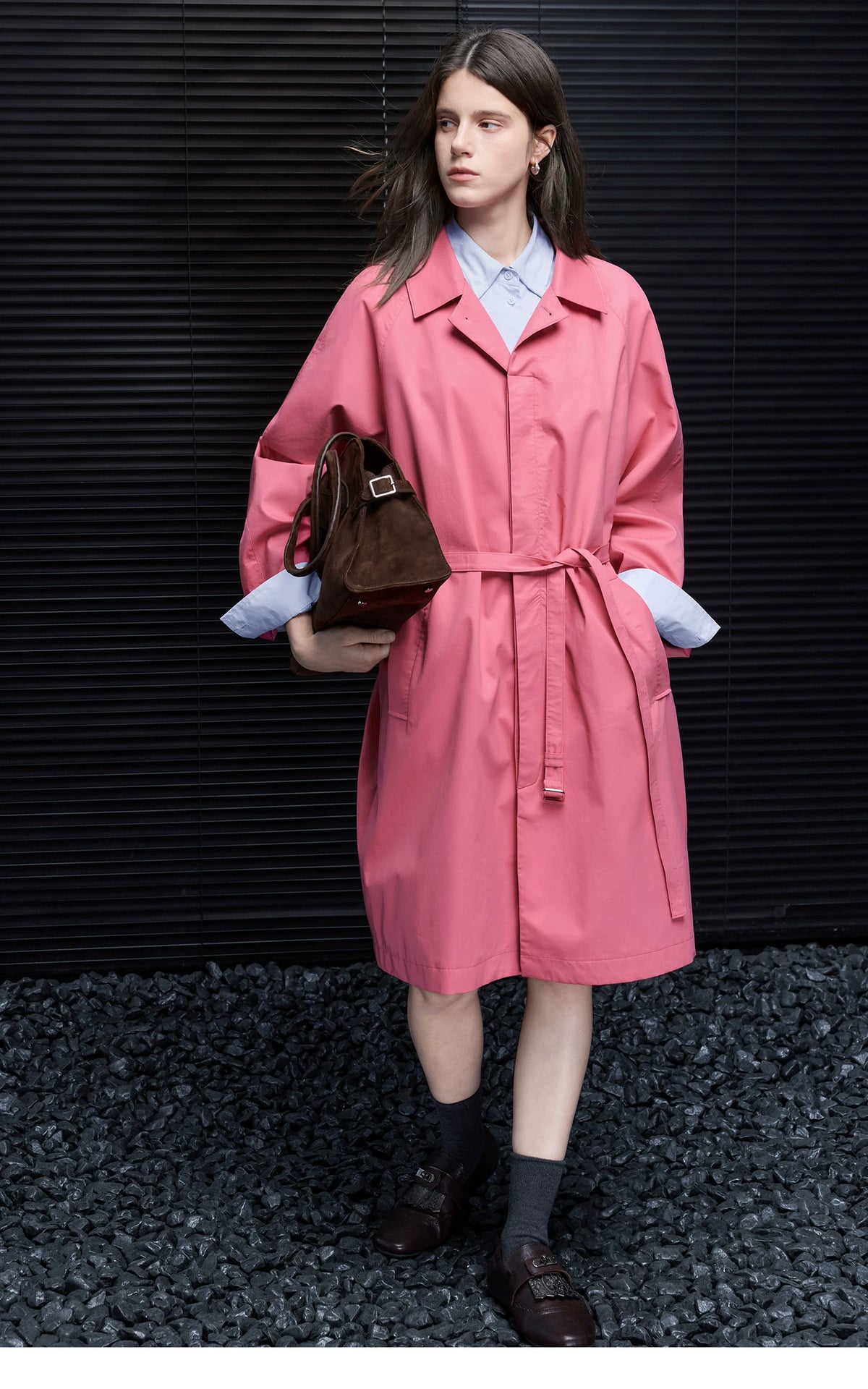 Full-length front view of a Rose Pink belted trench coat with wide raglan sleeves and in-seam pockets
