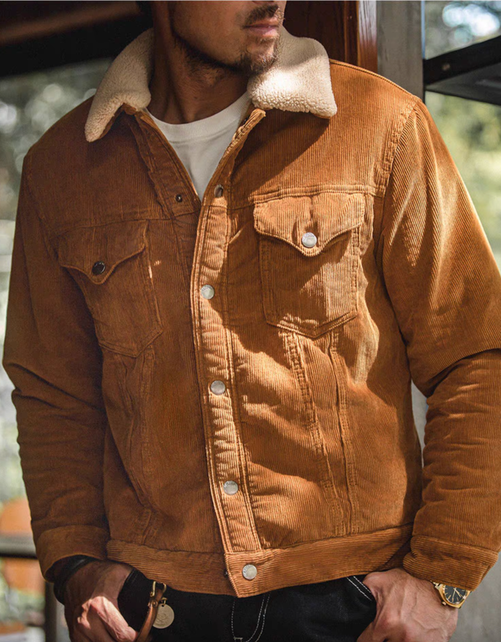 Man wearing Rust Corduroy Trucker Jacket with Sherpa Collar in Ginger Yellow showing button front closure and chest flap pockets