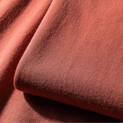 Rustic T-Shirt red cotton fabric close-up showing soft breathable texture detail