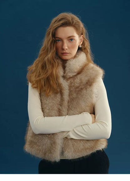 Front view of a Sand cropped faux fur vest with tipped beige and cream pile